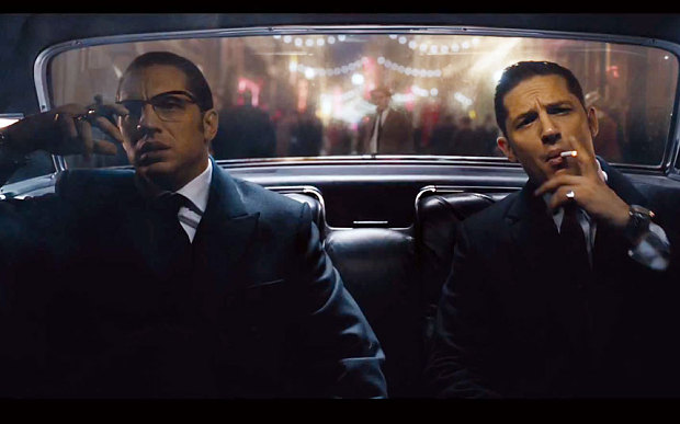 Still of Tom Hardy playing both Kray twins in the film, Legend.