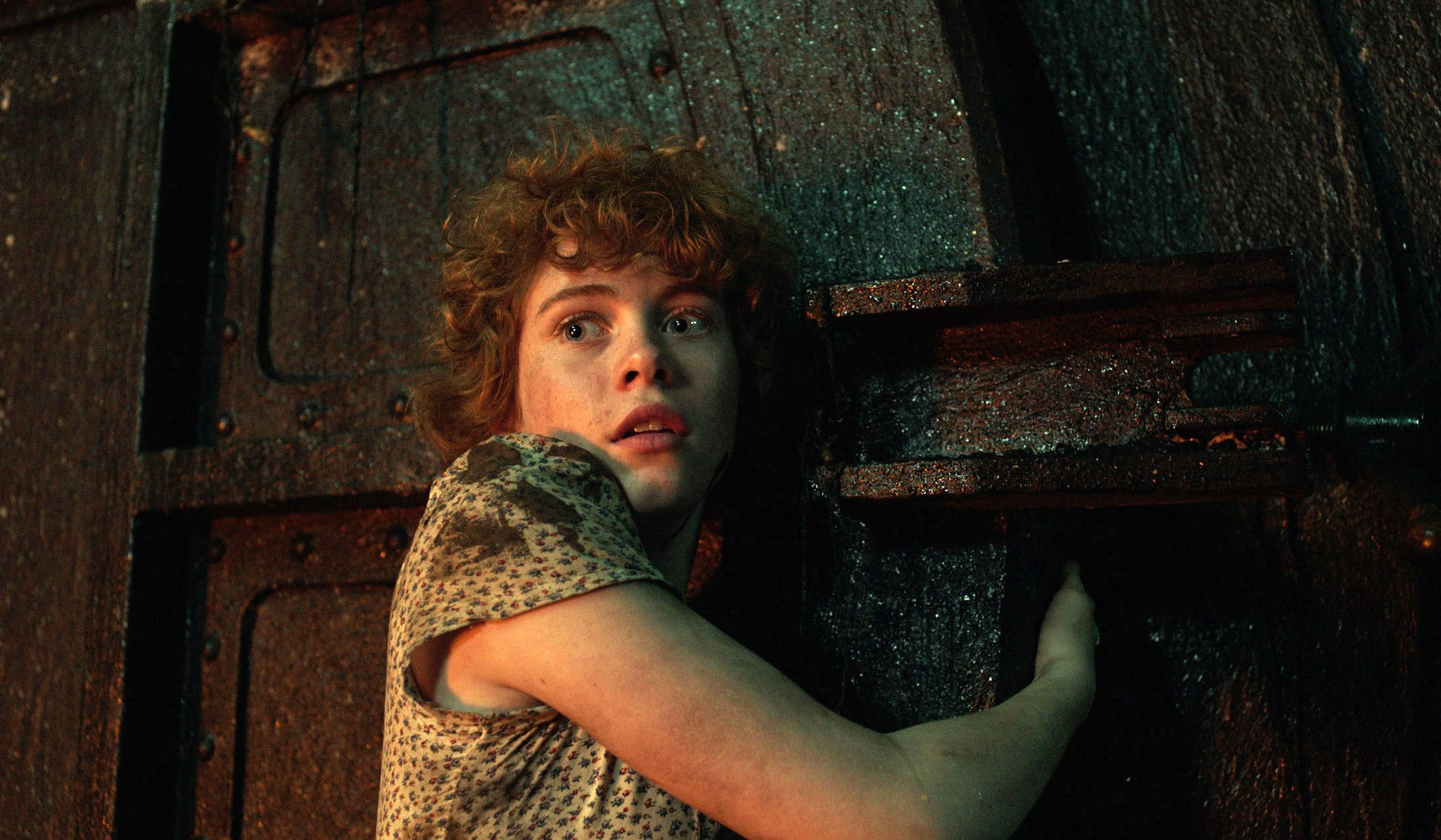 Press still from It that features the character Beverly Marsh.